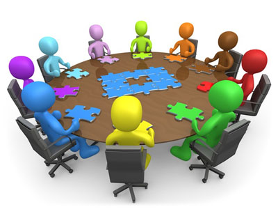 Image of people sitting at round table